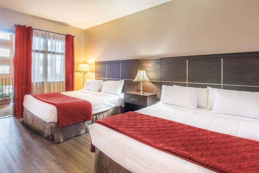Hotel Ambassadeur Et Suites Квебек Номер фото